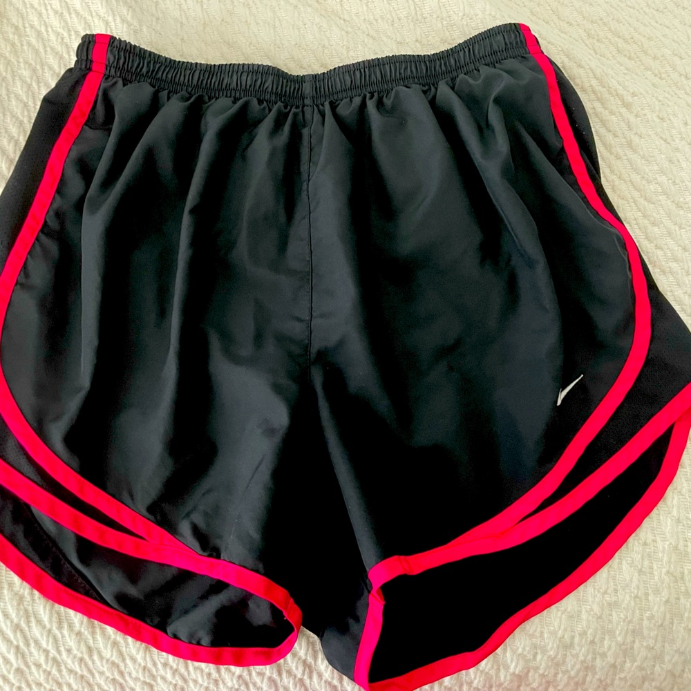 Women’s Nike workout shorts with built in underwear, key pouch.
